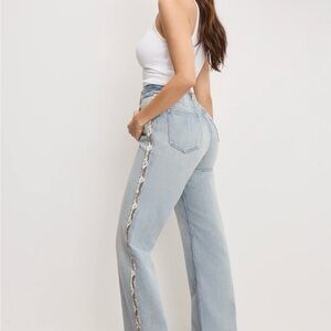 Good American Khloe Jeans with snakeskin detail Light Blue Flare Jeans - callout